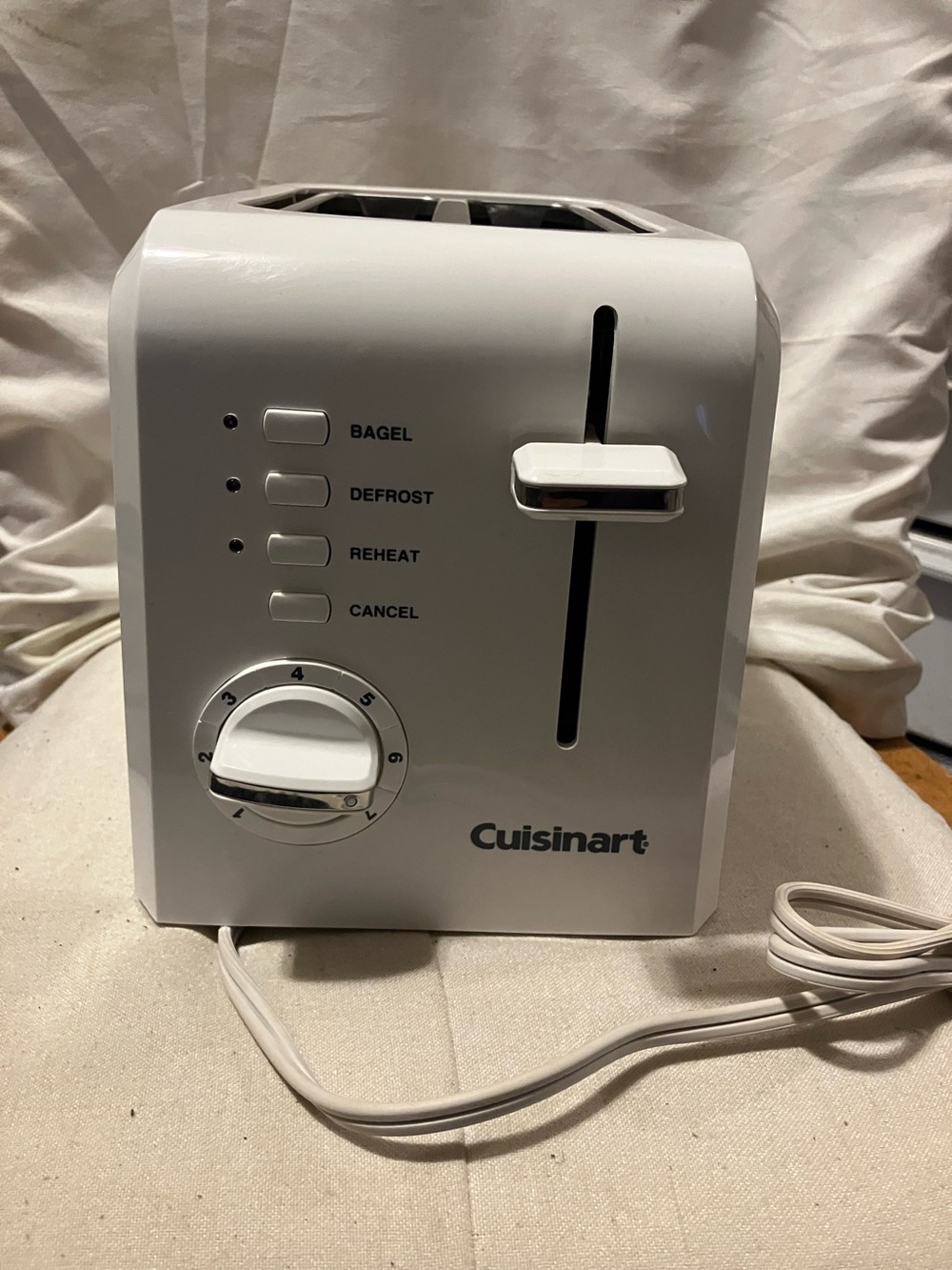Like new. ( maybe used once ) White Cuiinart 2 slice toaster - bagel maker in